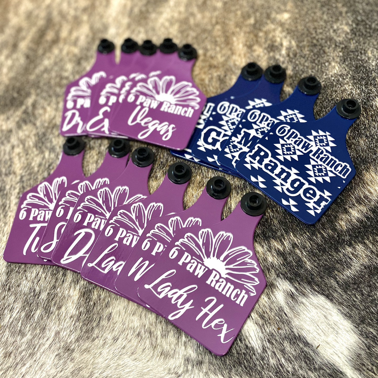 Custom laser-engraved cattle ear tag featuring durable Ritchey material with deep, long-lasting engraving. Includes Y-Tex button for secure attachment. Easy identification, weather resistance, and personalization with names, numbers, or ranch logos.