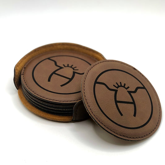 Custom engraved leatherette coaster set featuring a personalized design, perfect for ranchers, farmers, and livestock enthusiasts. Made from durable, easy-to-clean material, ideal for protecting surfaces while adding a rustic touch.