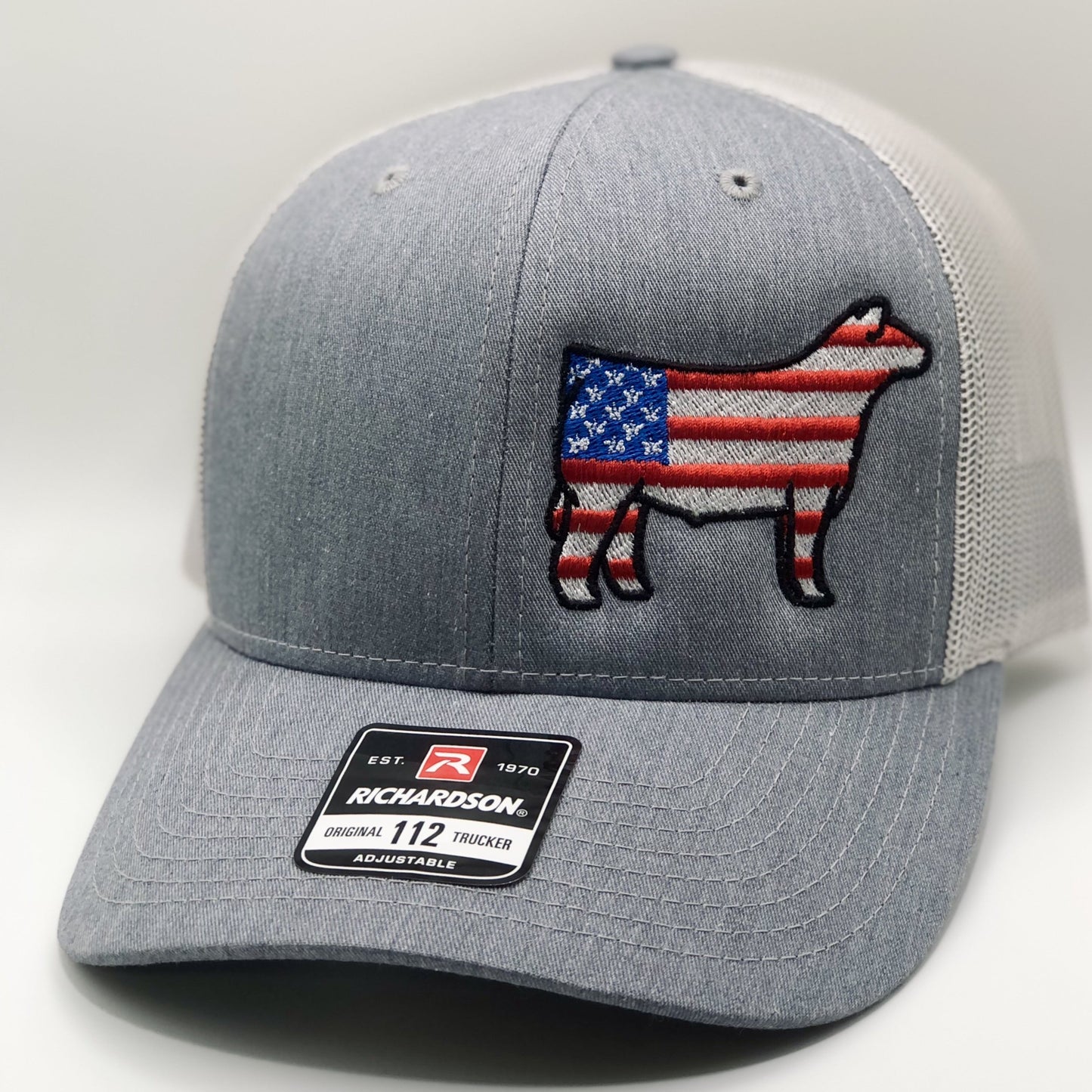 American flag show steer design embroidered on a Richardson 112 Trucker Hat