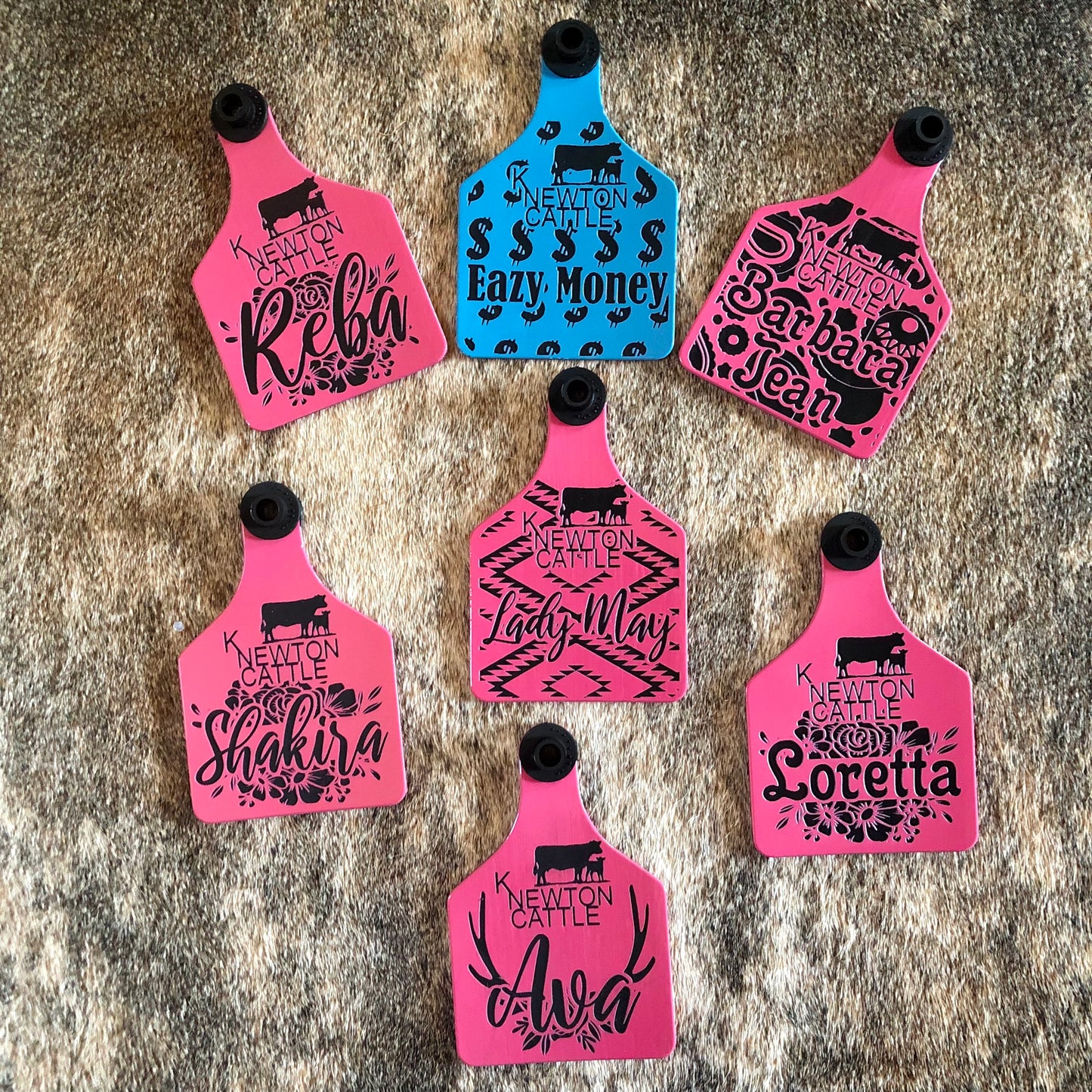 Custom laser-engraved cattle ear tag featuring durable Ritchey material with deep, long-lasting engraving. Includes Y-Tex button for secure attachment. Easy identification, weather resistance, and personalization with names, numbers, or ranch logos.