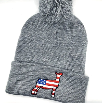 Grey knit beanie with an embroidered graphic of a show lamb with the American flag pattern.