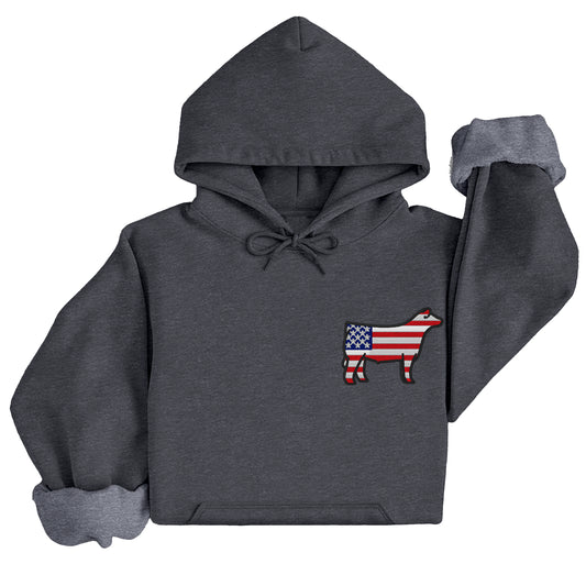 A dark heather grey hooded sweatshirt with an embroidered American flag patterned show steer.