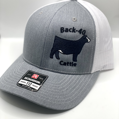 Custom embroidered livestock hat featuring detailed animal designs such as cattle, pigs, goats, and more. Available in various hat styles and colors, perfect for farmers, ranchers, and livestock enthusiasts. High-quality stitching ensures a durable and stylish look. Personalization options available for a unique touch.