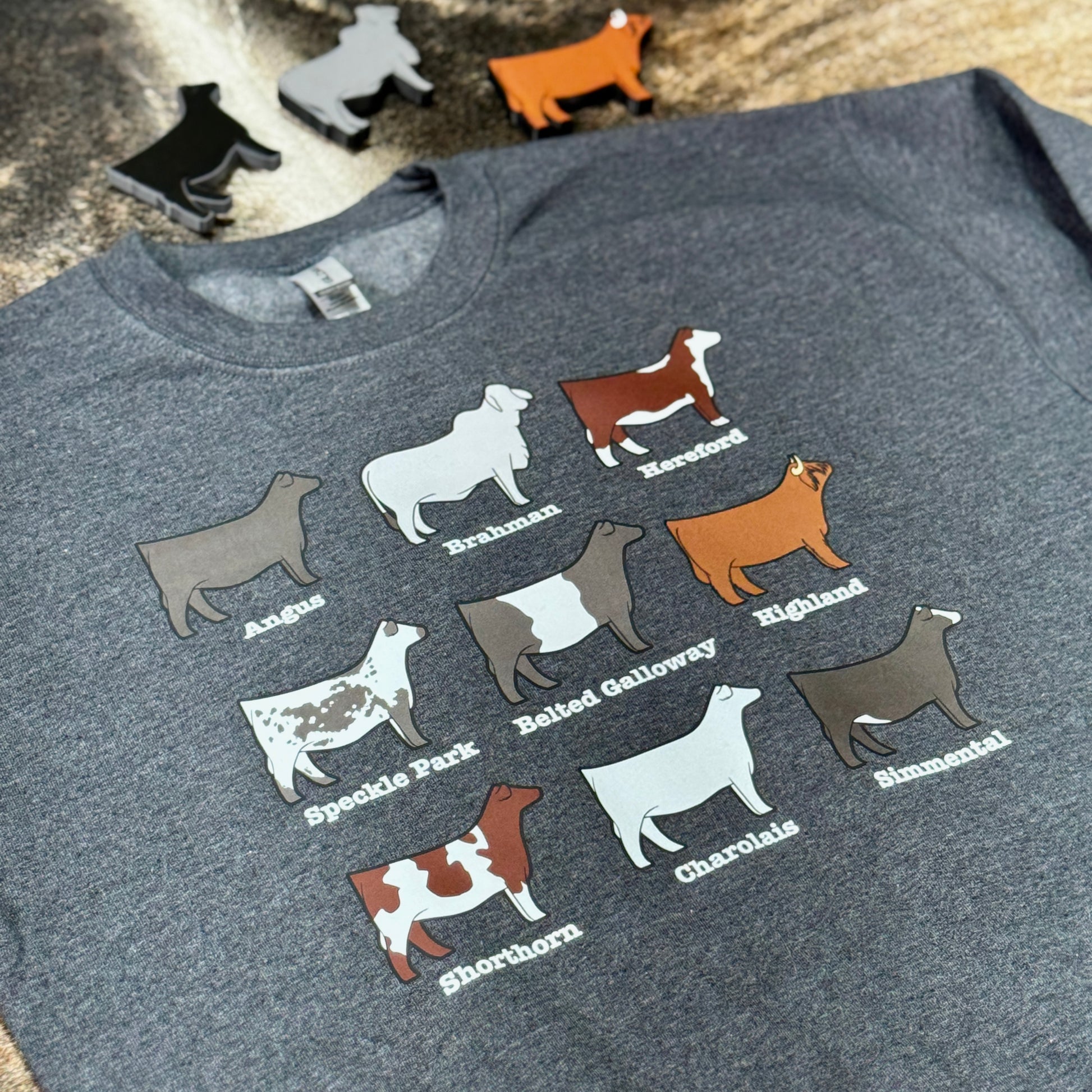 Grey pullover sweatshirt with 9 different popular beef cattle breeds.