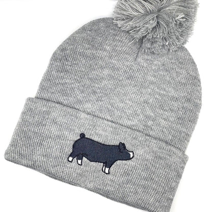 High quality custom embroidery of a Berkshire show pig on a comfy beanie hat.