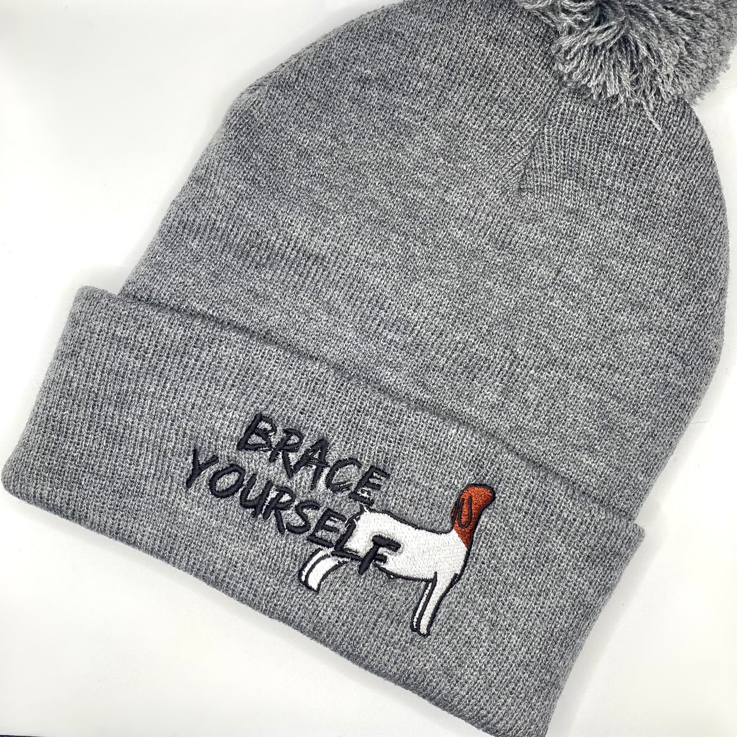 Comfy beanie hat featuring high quality embroidery of a Boer show goat with the text "Brace Yourself".