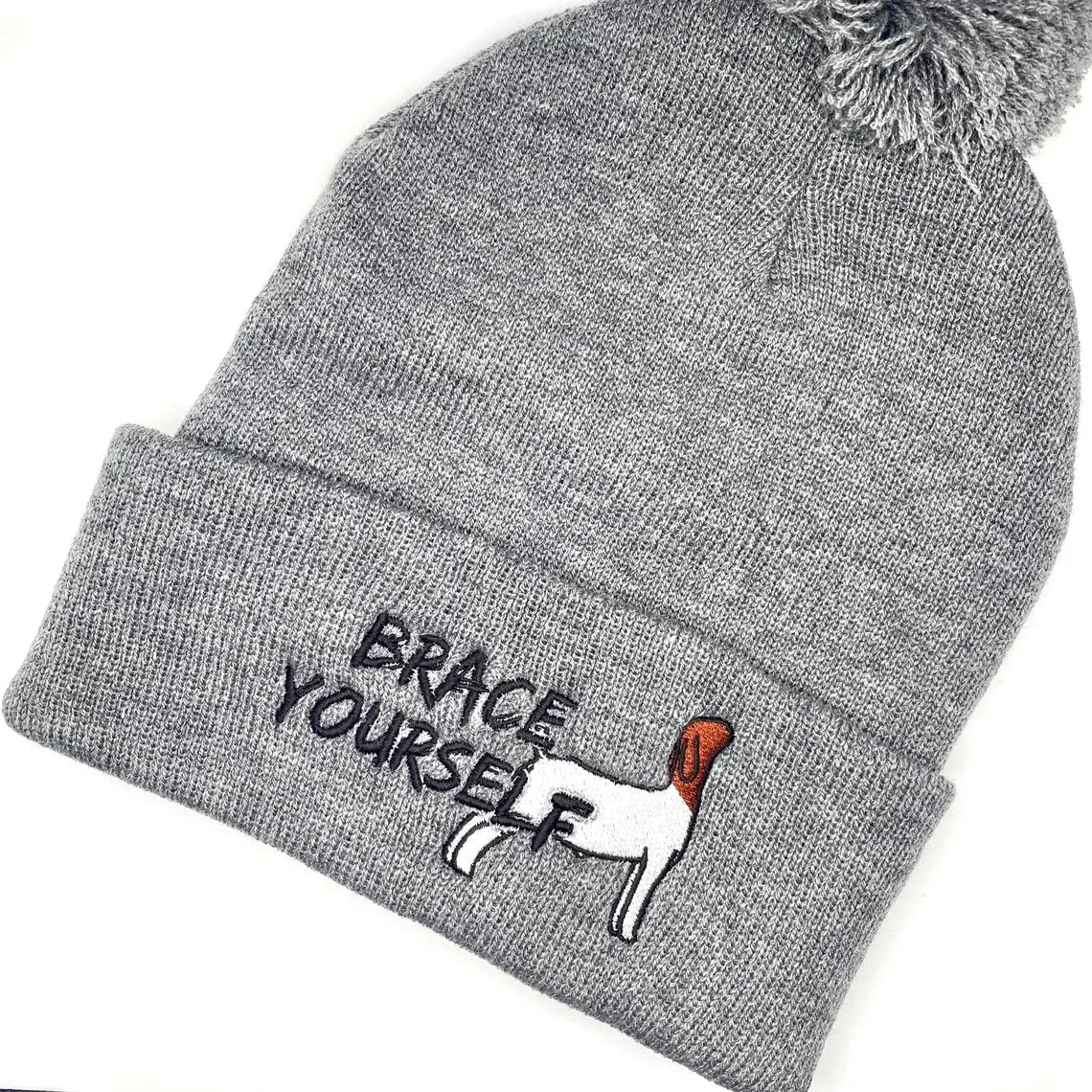 Comfy beanie hat featuring high quality embroidery of a Boer show goat with the text "Brace Yourself".