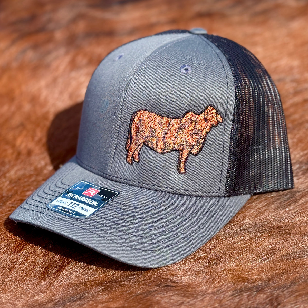 Richardson 112 charcoal grey hat featuring an embroidered Brindle Brahman cow design.