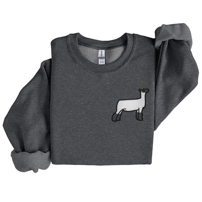 A dark grey crewneck pull over sweatshirt featuring an embroidered show sheep on the left chest.