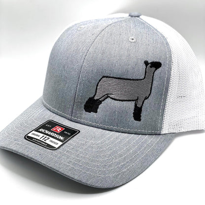 Richardson 112 trucker hat featuring an embroidered natural sheep design, available in multiple colors with a breathable mesh back and adjustable snapback closure.
