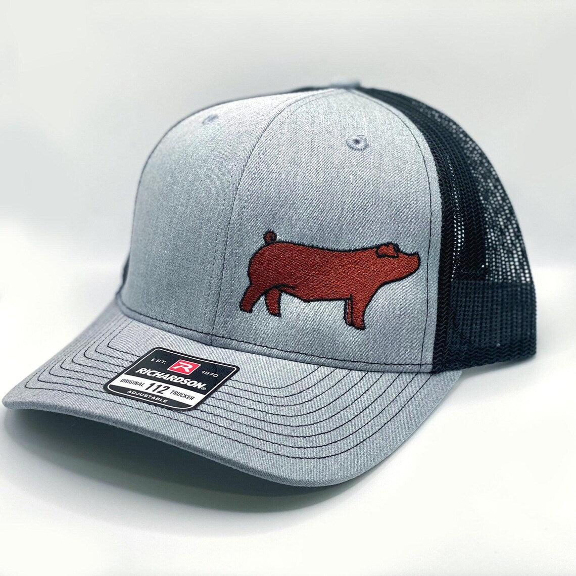 Richardson 112 hat featuring high quality embroidery of a Duroc show pig, great gift idea for pig breeders or pig showmen.