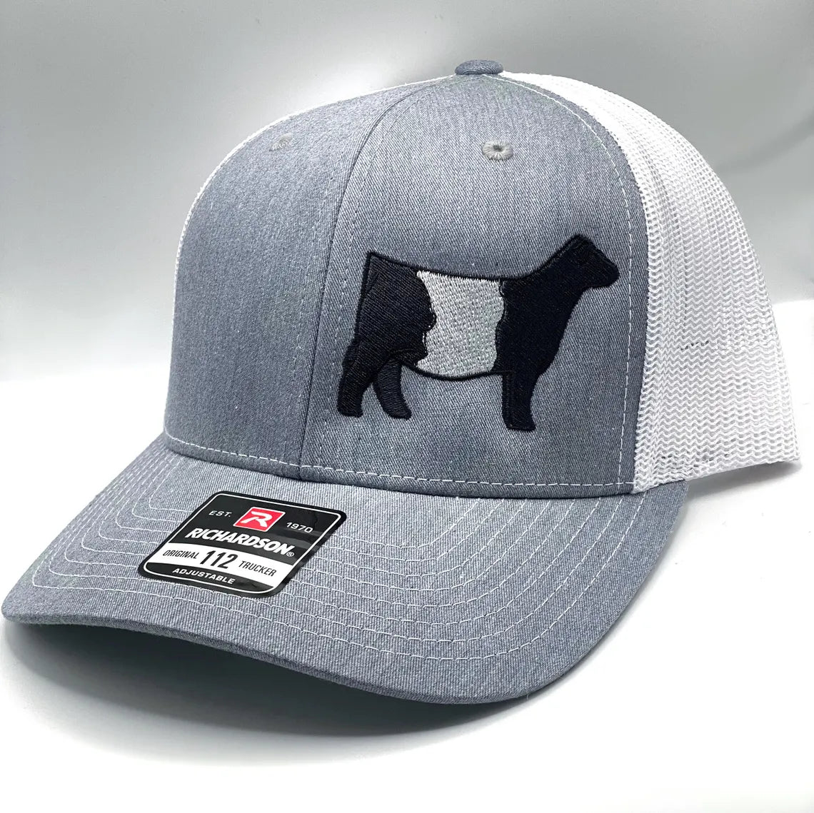 Richardson 112 hat featuring high quality embroidery of a Belted Galloway show heifer. 