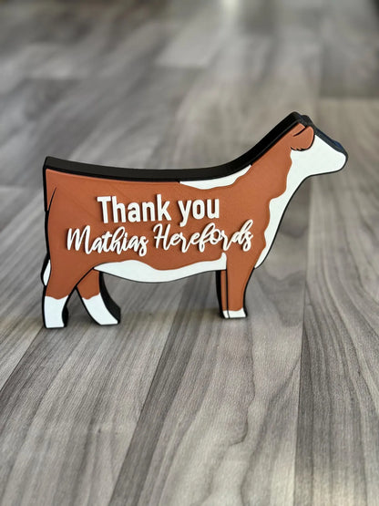 A Hereford free standing figure thanking a cattle company