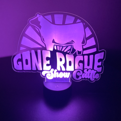 Custom LED light sign made from clear acrylic, personalized with text or design. The LED base is remote-controlled and can be powered by USB or batteries. Perfect for home decor or as a unique gift.