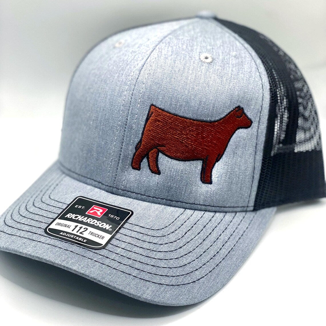 Richardson 112 embroidered hat featuring a Red Angus show heifer design.