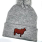 High quality embroidered beanie featuring a Brahman show heifer.