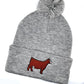 Comfy winter beanie hat with high quality embroidery of a red Simmental heifer with a blaze face.
