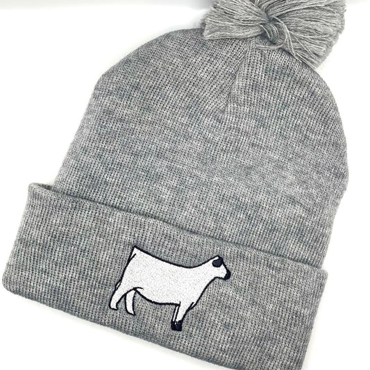British White embroidered show heifer on a comfy winter beanie hat.