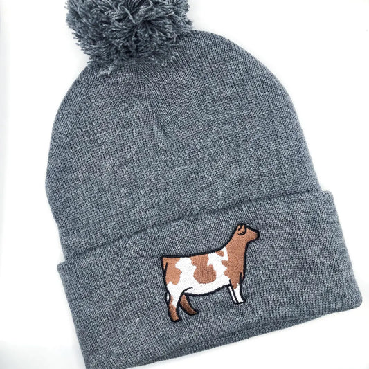 Embroidered Shorthorn beanie featuring a detailed livestock design, perfect for farmers, ranchers, and livestock show enthusiasts. Made from soft, warm fabric to keep you cozy during barn chores, stock shows, and chilly days.