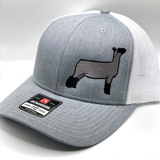 Richardson 112 trucker hat featuring an embroidered natural sheep design, available in multiple colors with a breathable mesh back and adjustable snapback closure.