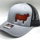 Gray and black Richardson 112 trucker hat featuring an embroidered red Brahman cattle silhouette on the front panel. The hat has a structured fit, mesh back, and an adjustable snapback closure