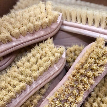 A custom engraved livestock brush with a solid wood handle and sturdy bristles, personalized with a farm name, logo, or initials. Perfect for grooming horses, cattle, goats, and other livestock. For farmers, ranchers, and animal lovers.