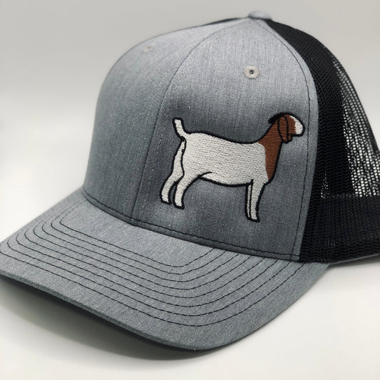 Embroidered goat design on a trucker hat with breathable mesh and an adjustable fit. Perfect for goat lovers, farmers, and showmen. A stylish, comfortable cap ideal for everyday wear or for showing off your goat pride at the barn.